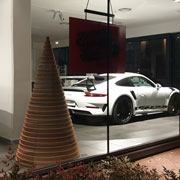 Ecodesign: Alberi di Natale in cartone by Lessmore, Design Giorgio Caporaso per l'autosalone Porsche a Varese. Natale Green ed ecosostenibile