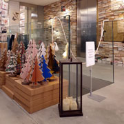 Cardboard Christmas trees by Lessmore, Design Giorgio Caporaso in the Ubik Varese bookshop. Circular economy for a Green and eco-sustainable Christmas