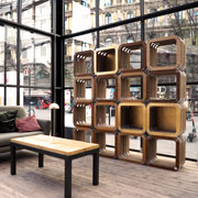 More Light: cardboard bookcase with gold leaf trims designed by Giorgio Caporaso for Lessmore. Milan Piazza Castello. DDN Phutura | Milan Design Week 2019